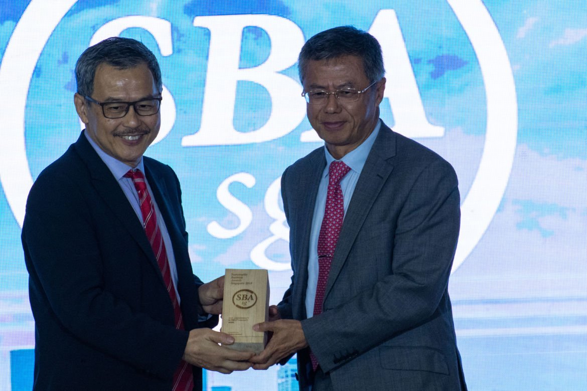 Speaking of Sustainability Mr. Bey Soo Khiang, Chairman, APRIL Group (right), receiving one of APRIL’s awards at the Sustainable Business Awards in Singapore.